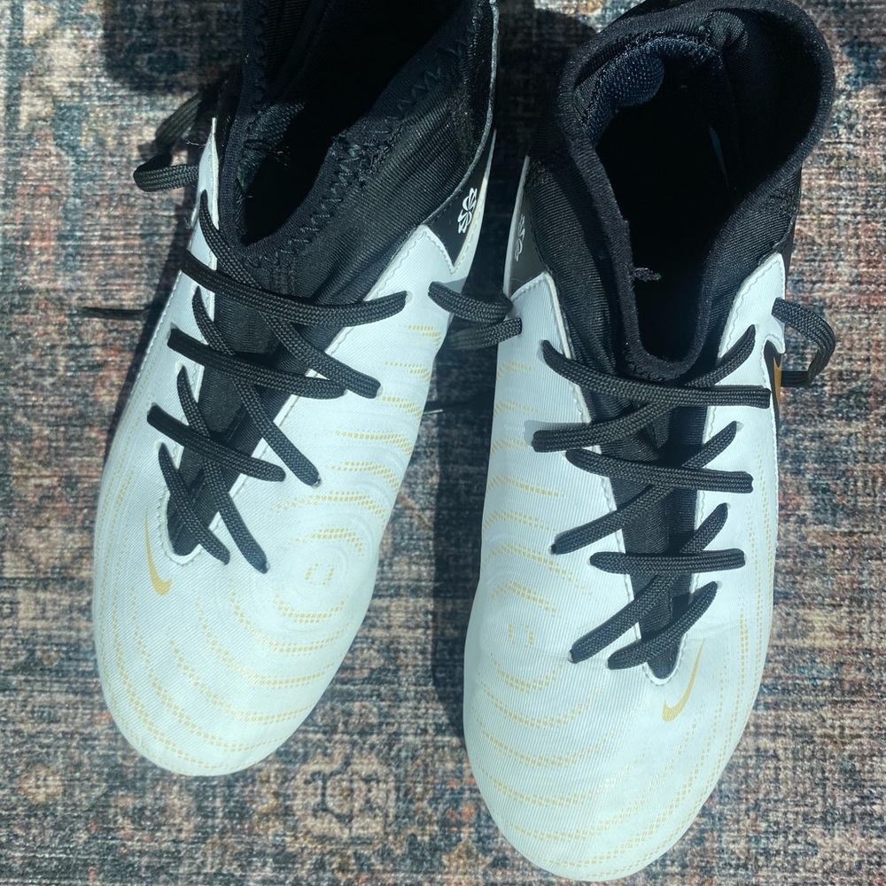 Nike White and Black Cleats with Gold Accents